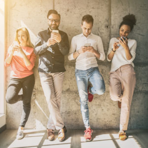 young people using smart phone technology